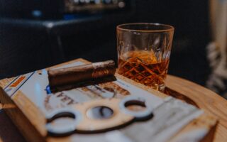 clear drinking glass on brown wooden table